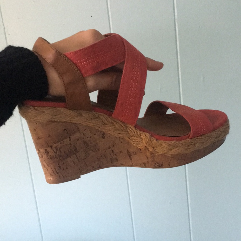 Tan and coral wedges